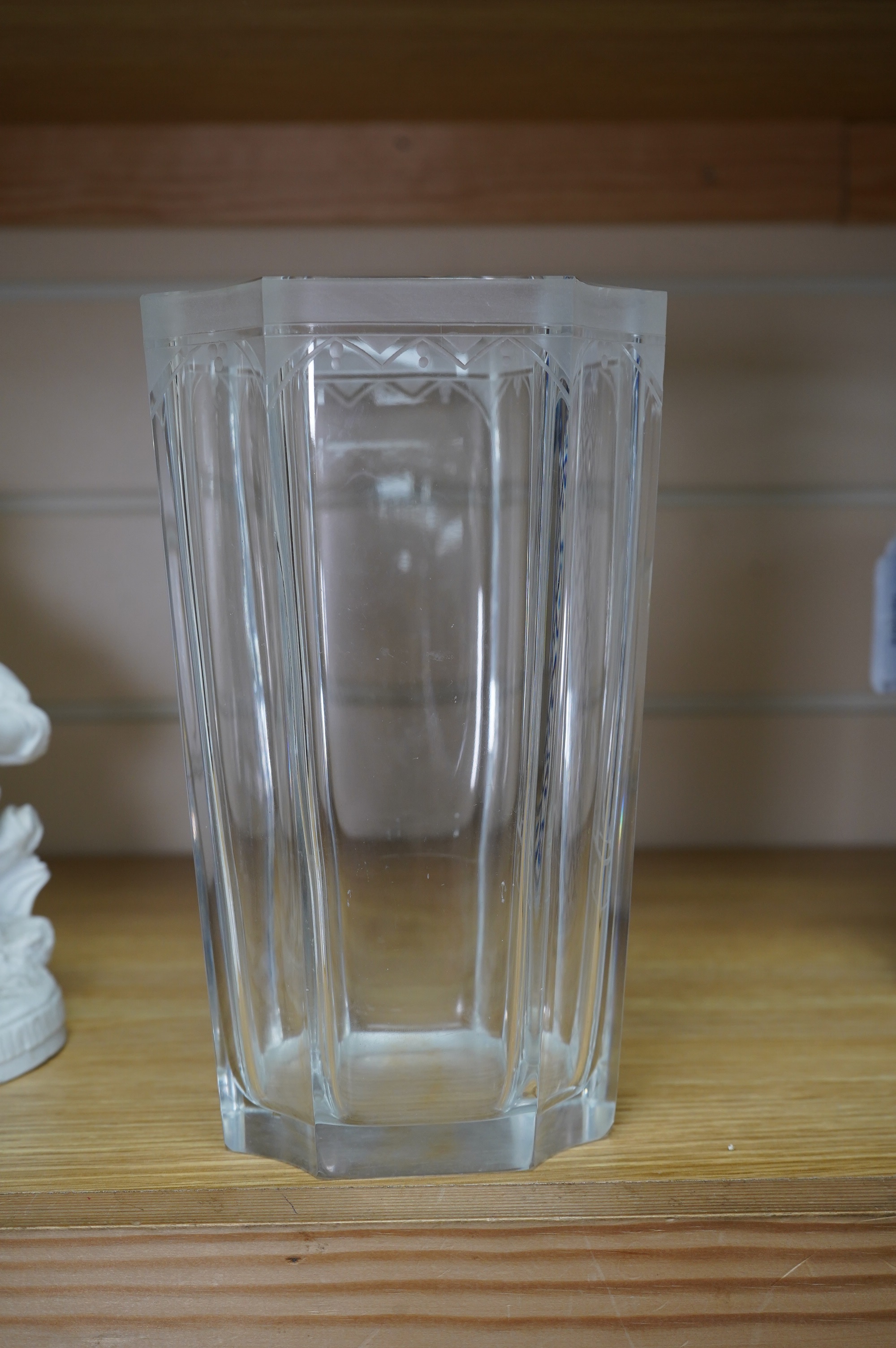Emil Weidlich for Elme, a 1930s Swedish cut and etched glass vase decorated with a figure tipping a floral cornucopia. Condition - minute chips to two corner tips of the rim otherwise very good, The glass engraver Weidli